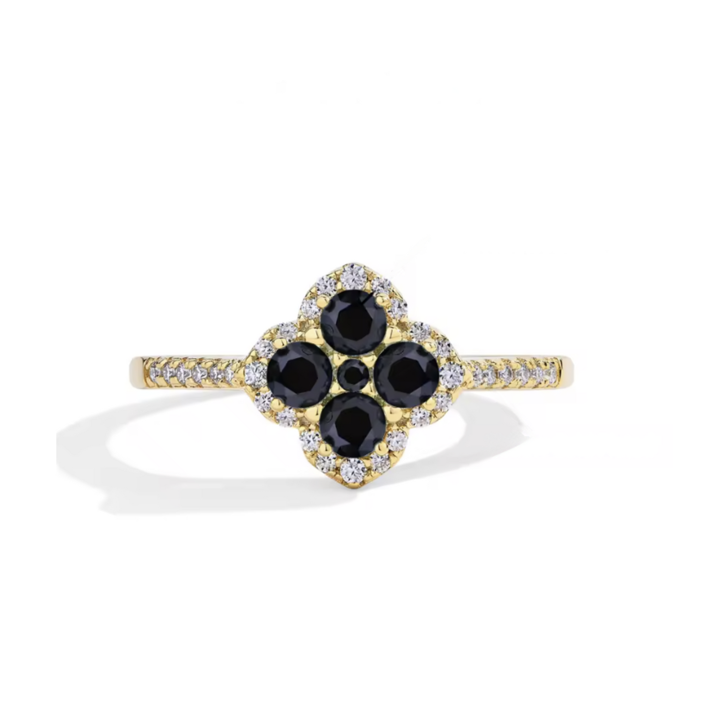 An exquisite white gold clover ring with a central black moissanite stone, surrounded by a halo of smaller black moissanite stones and a outer circle of clear pavé-set stones.