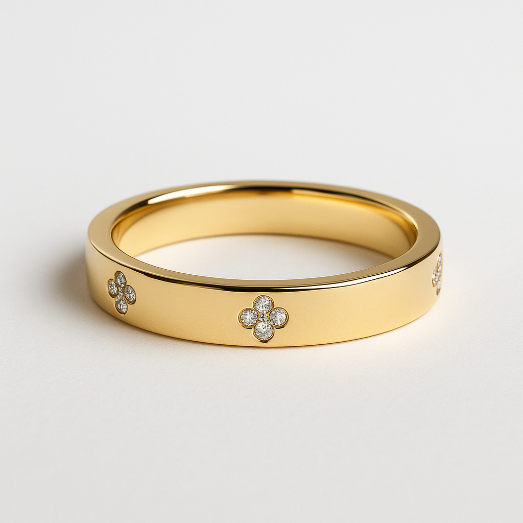 Gold band with moissanite clover motif design on a beige background